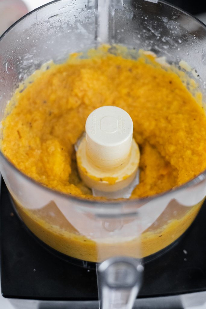 Pureed butternut squash in a food processor (how to make butternut squash macaroni and cheese process shot)