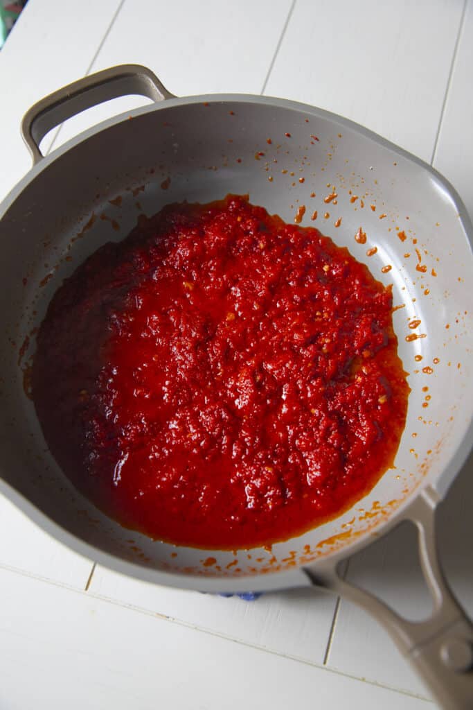 Red sauce with tequila in a pan