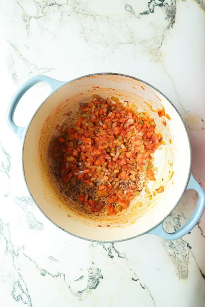 Making an italian pasta fagioli recipe.