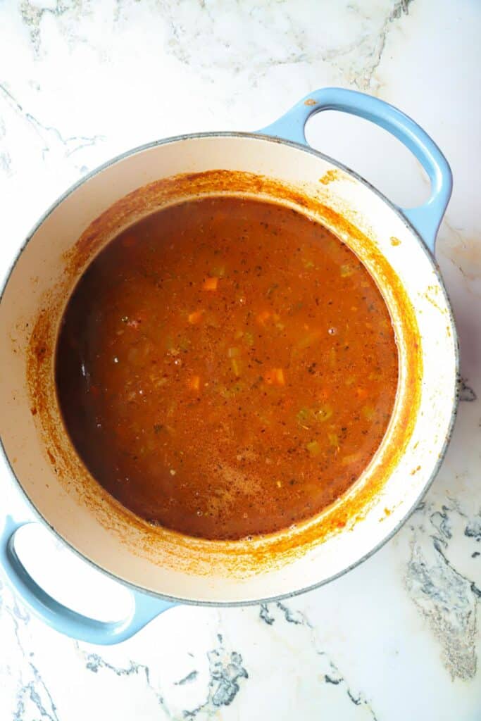 Making an italian pasta fagioli recipe.