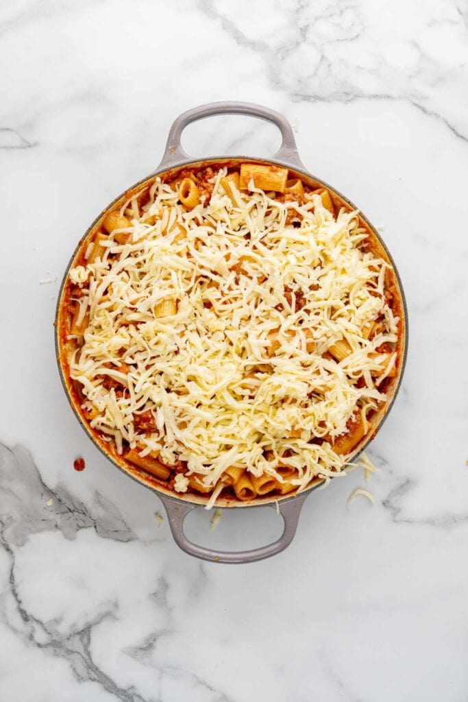 Preparing baked bolognese.