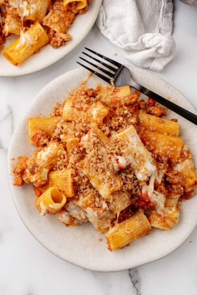 Baked bolognese topped with breadcrumbs.