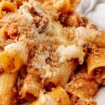 Baked bolognese with rigatoni and buttery breadcrumbs.