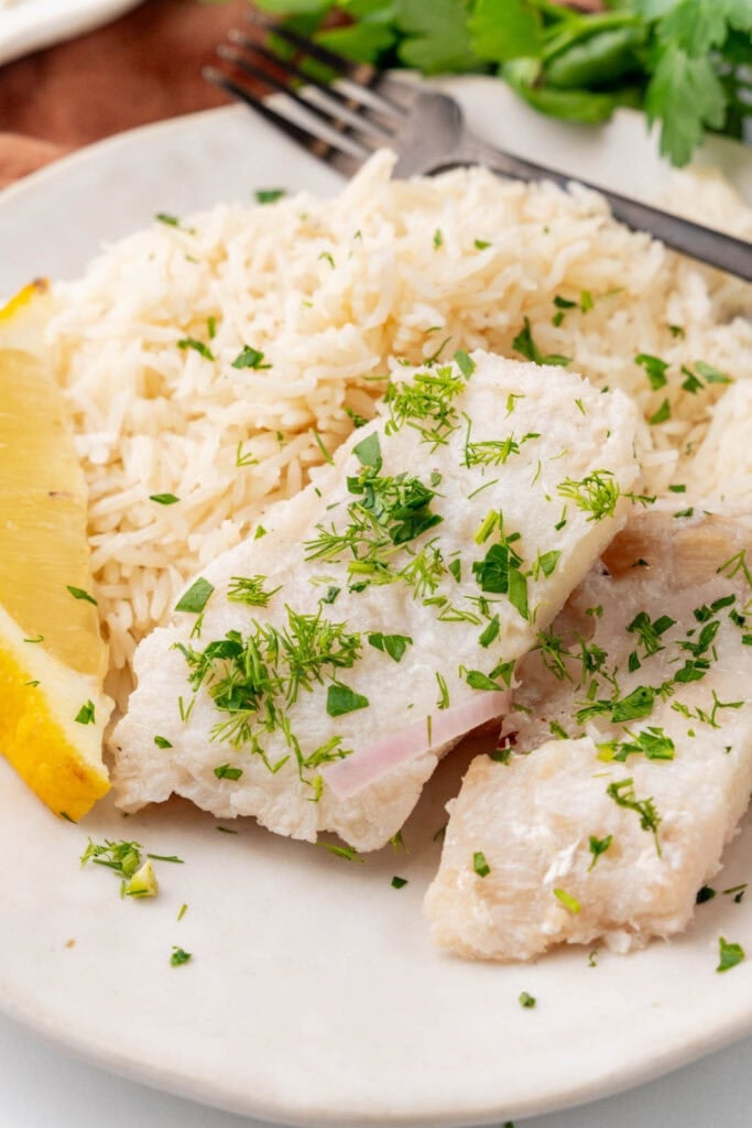 Poached cod with herbs and lemon.