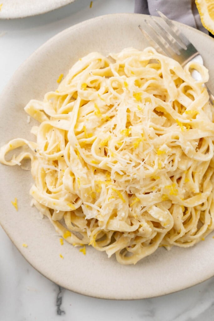 Tagliatelle al limone with fresh lemon zest.