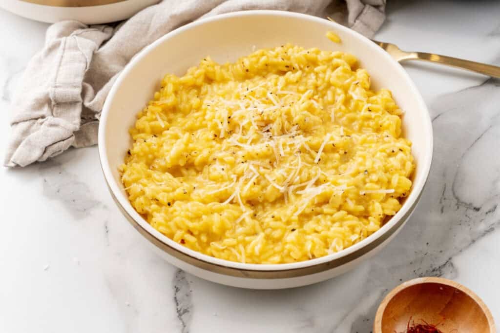Risotto milanese in a bowl.