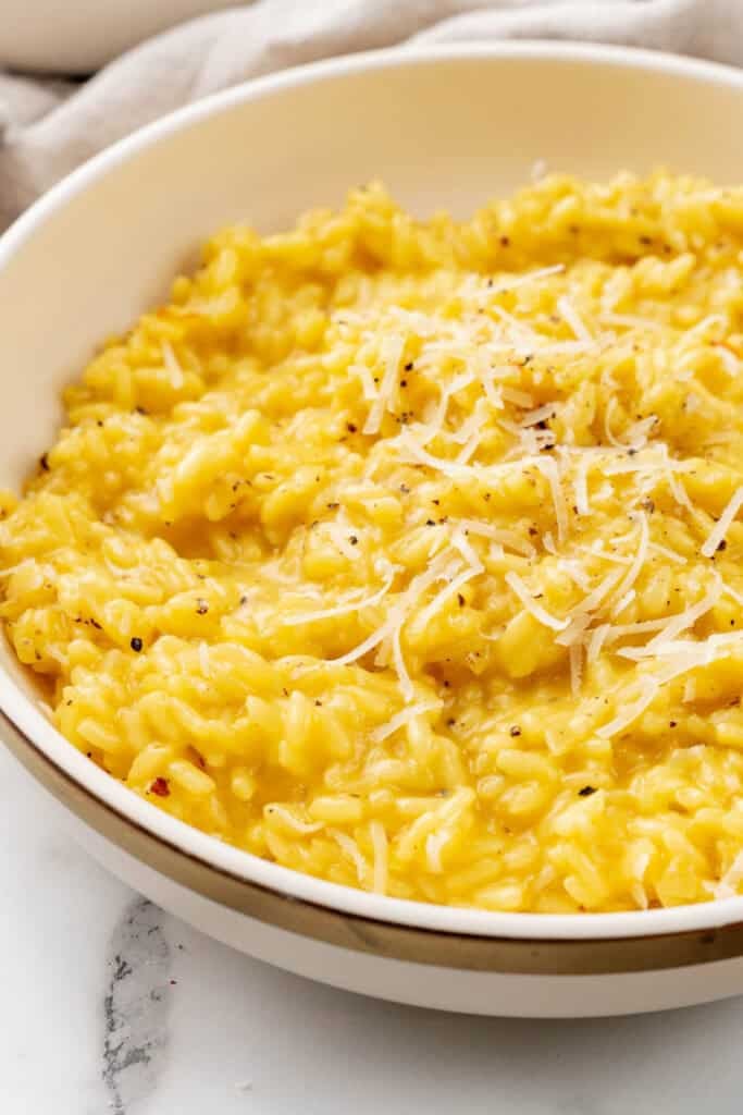 Risotto milanese in a bowl.