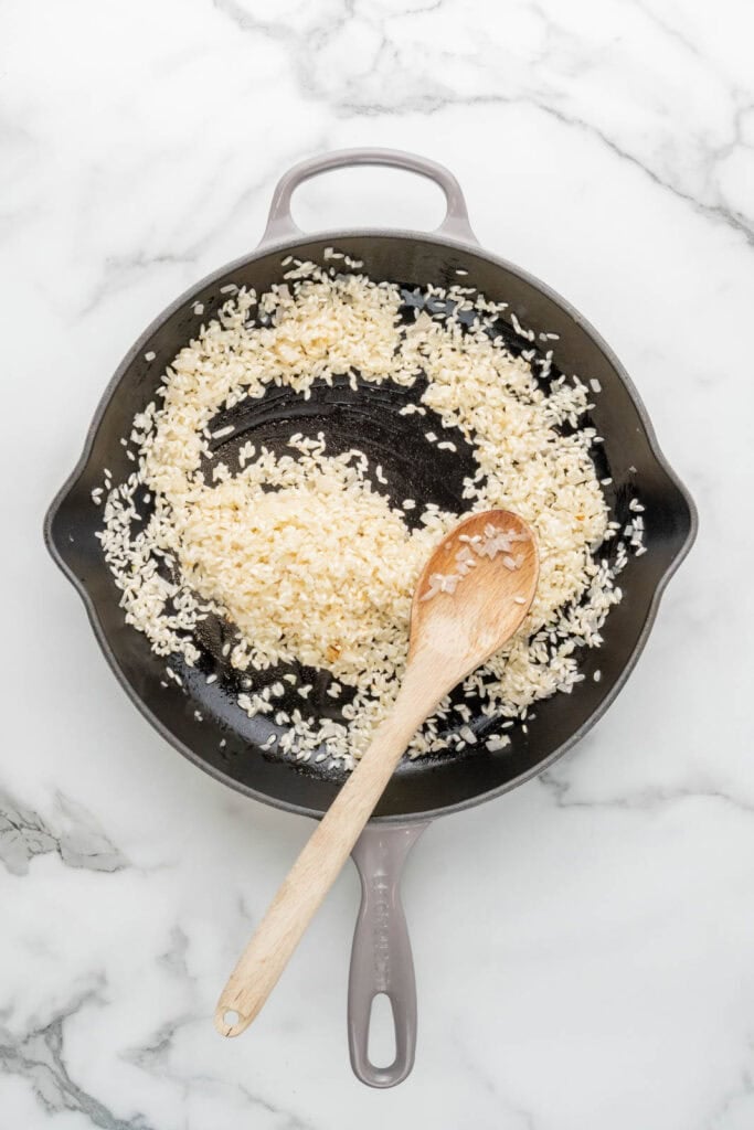 Cooking risotto milanese.