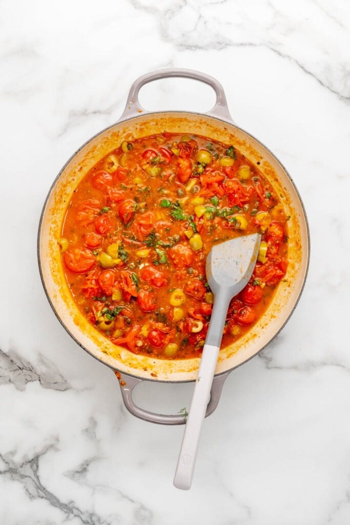 Tomato sauce base with olives.