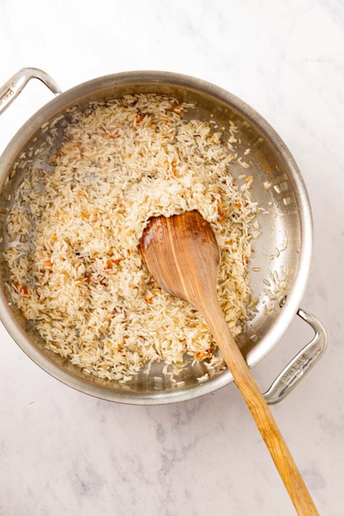 Cooking rice in a pan.