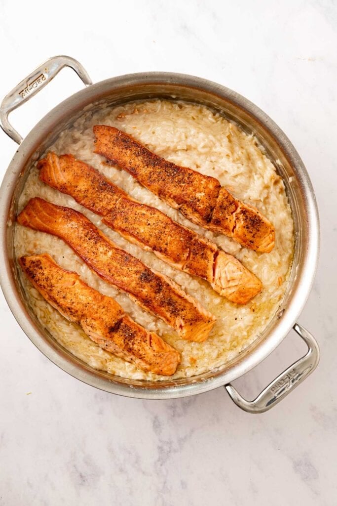 Salmon and rice in a pot.