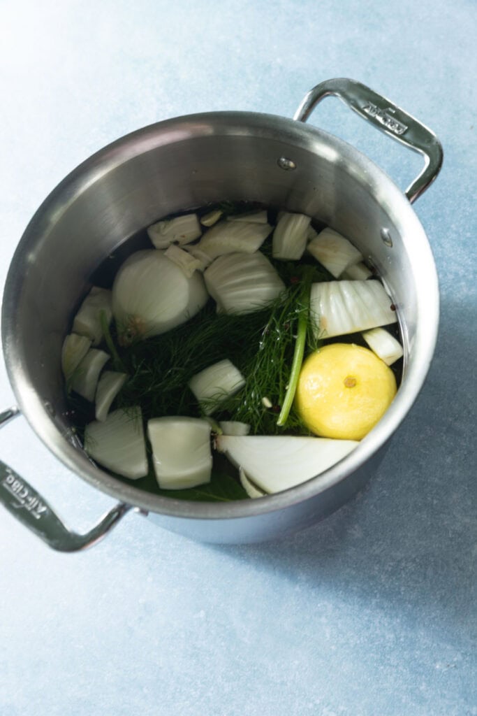 Court bouillon for poaching shrimp.