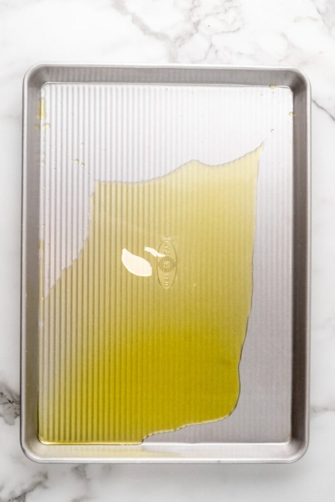 Oil on a sheet pan.