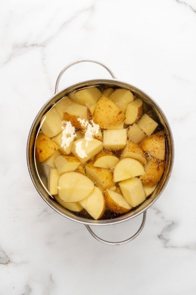 Boiling potatoes.