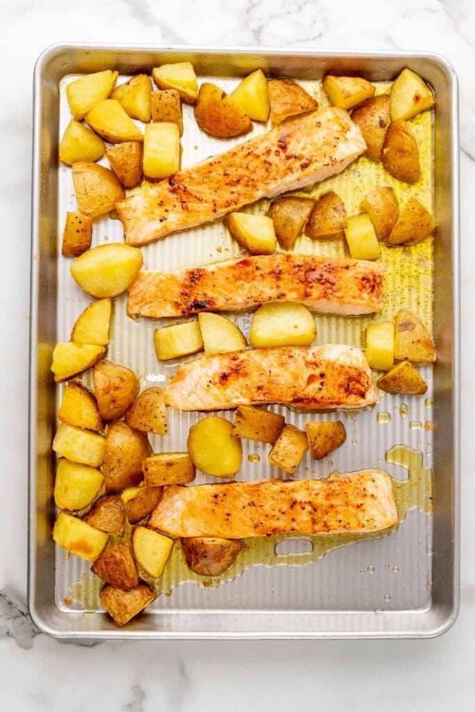 Salmon and potatoes on a sheet pan.