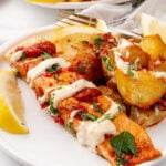 Salmon with patatas bravas.