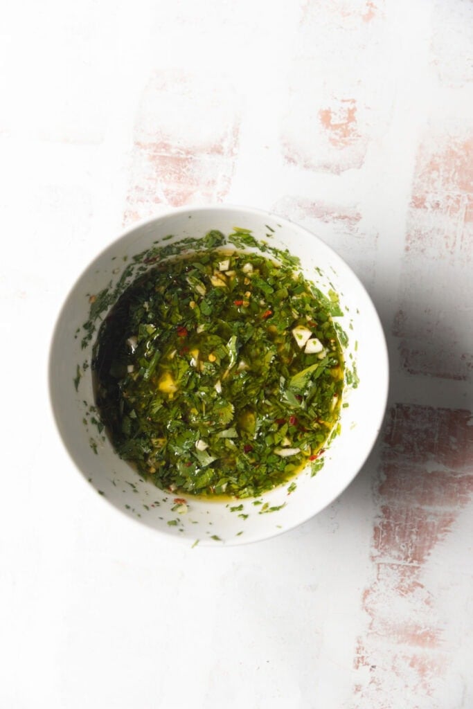 Chimichurri sauce in a bowl.