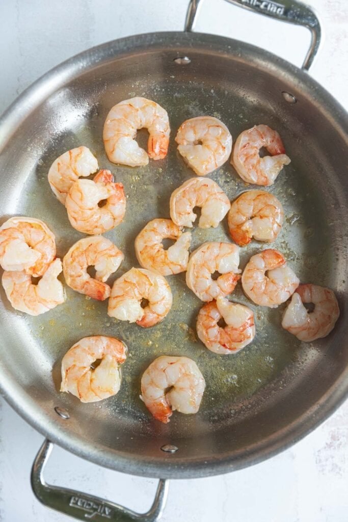 Cooking shrimp in a pan.