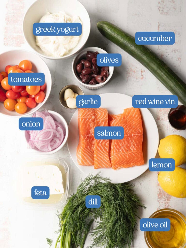 Ingredients for salmon with yogurt sauce and greek salad.