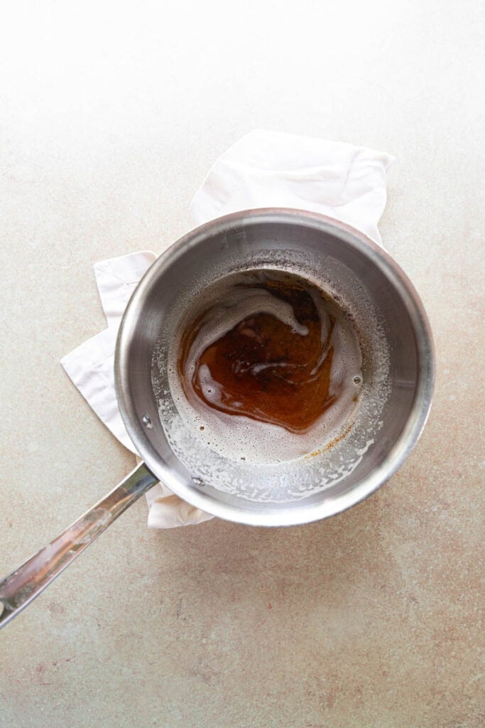 Melted and browned butter in a pan.