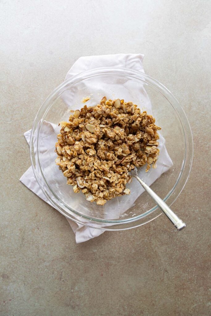 A crumble topping with oats in a bowl.