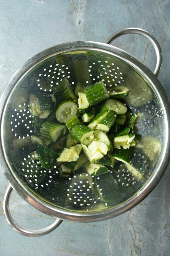Cucumbers in a colander.
